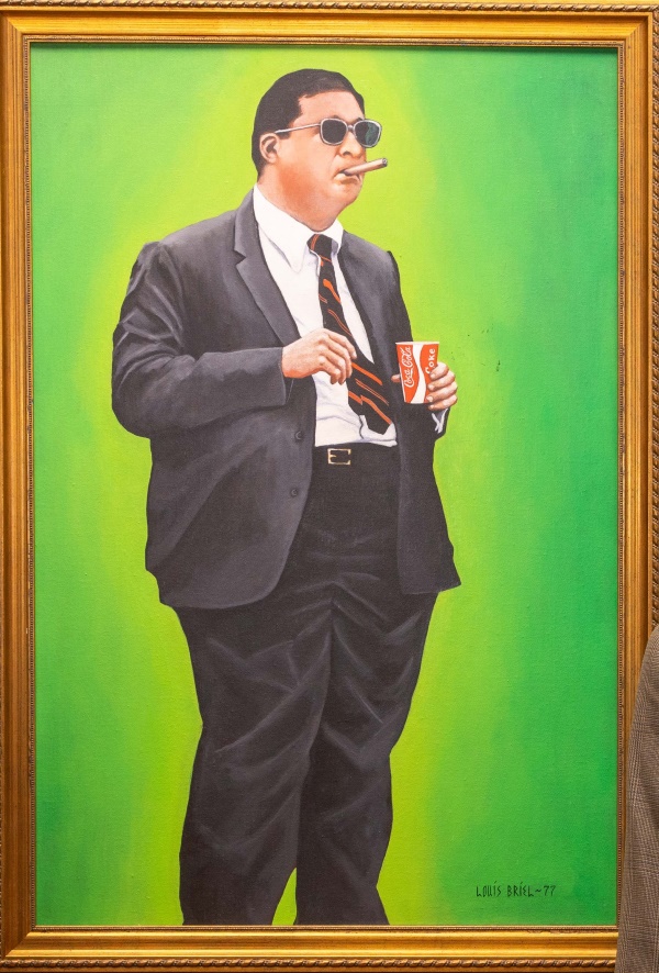 a painting of Dr. Brinkley with a cigar in his typical postural stance