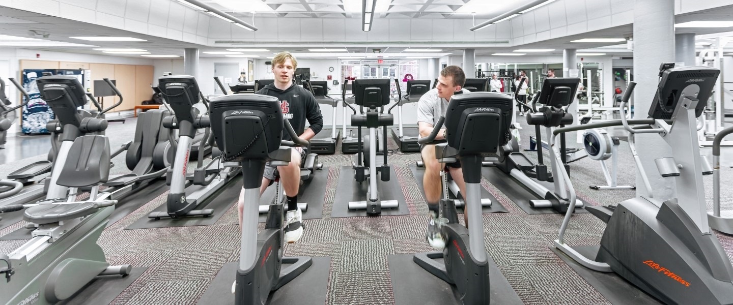 Students working out in the fitness cardio center